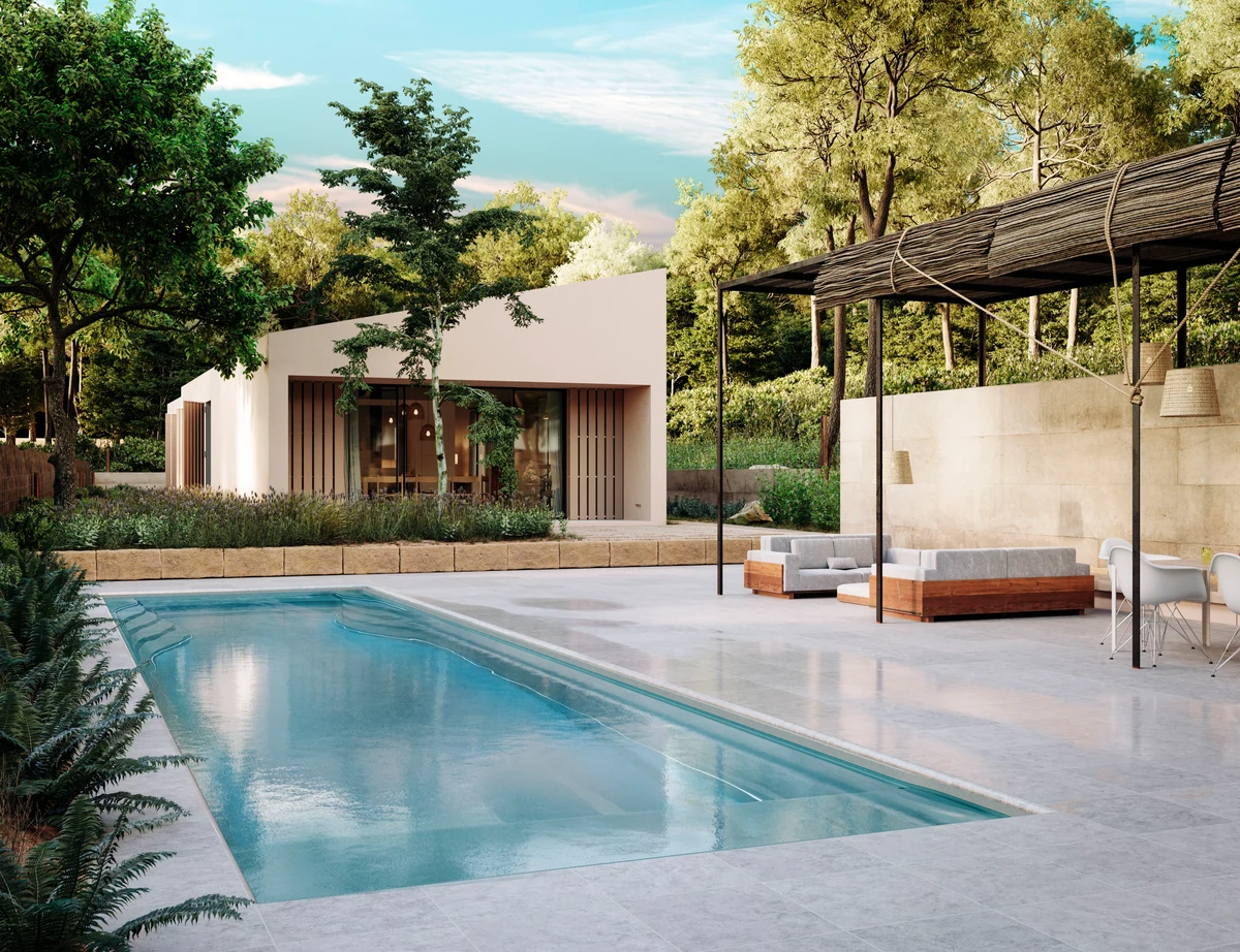 Pool mit heller Natursteinterrasse, überdachtem Sitzbereich und grünem Garten